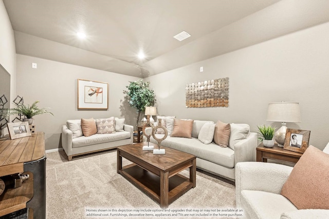 living room featuring baseboards, carpet, and visible vents