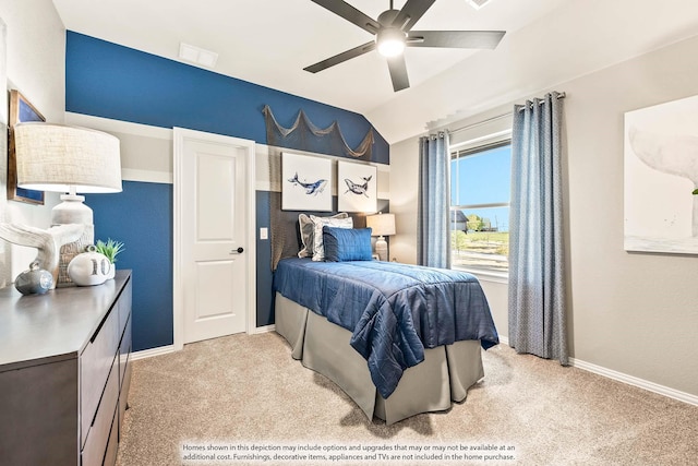 bedroom featuring light colored carpet, baseboards, visible vents, and lofted ceiling