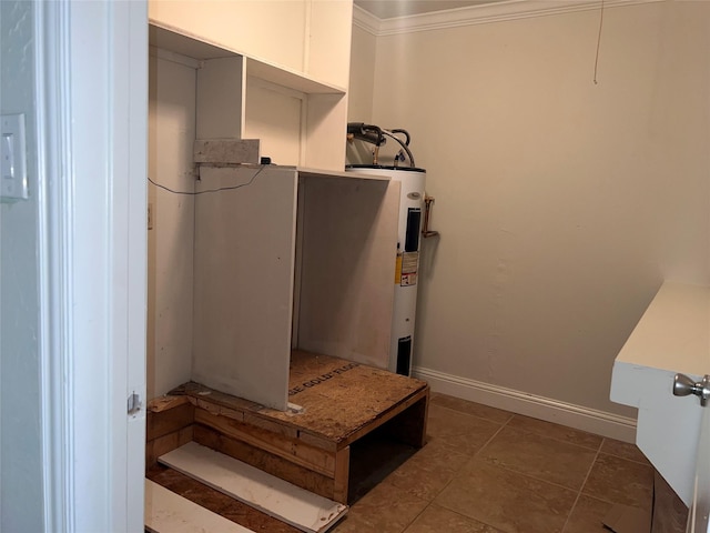 1005 Bass Dr, Plano, TX 75025 - mudroom with crown molding, baseboards, and electric water heater