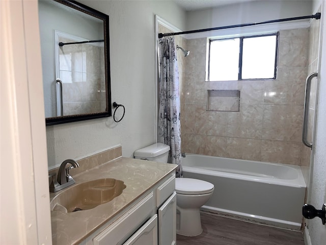 1005 Bass Dr, Plano, TX 75025 - full bathroom featuring vanity, shower / bath combo, toilet, and wood finished floors