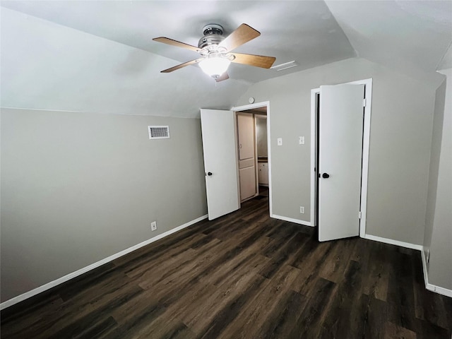 bonus room with ceiling fan, baseboards, lofted ceiling, visible vents, and dark wood-style floors