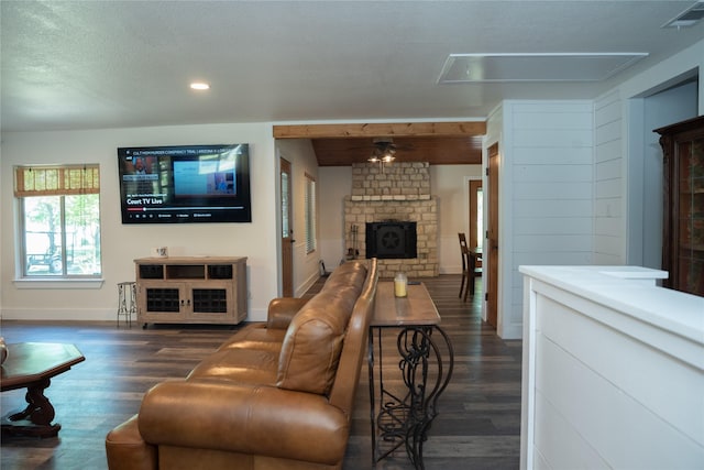1980 SE County Road 3310th Rd, Kerens, TX 75144 - living room with attic access, a stone fireplace, visible vents, wood finished floors, and baseboards