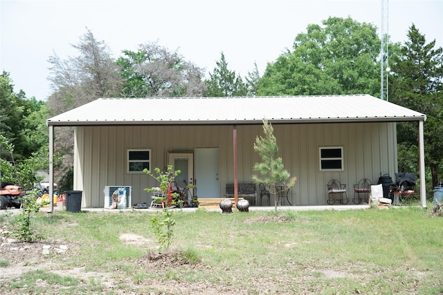 1980 SE County Road 3310th Rd, Kerens, TX 75144 - rear view of house with metal roof