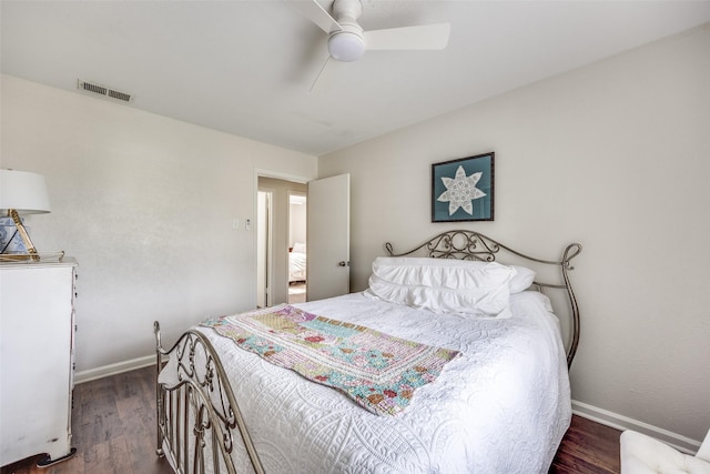 1200 Ridgeway Dr, Richardson, TX 75080 - bedroom featuring visible vents, a ceiling fan, baseboards, and wood finished floors