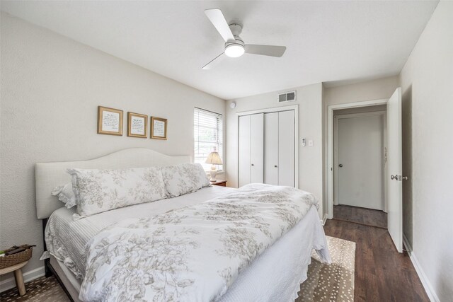 1200 Ridgeway Dr, Richardson, TX 75080 - bedroom featuring baseboards, a closet, dark wood finished floors, and visible vents