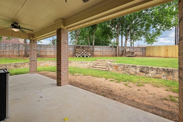 view of patio / terrace featuring a fenced backyard and ceiling fan