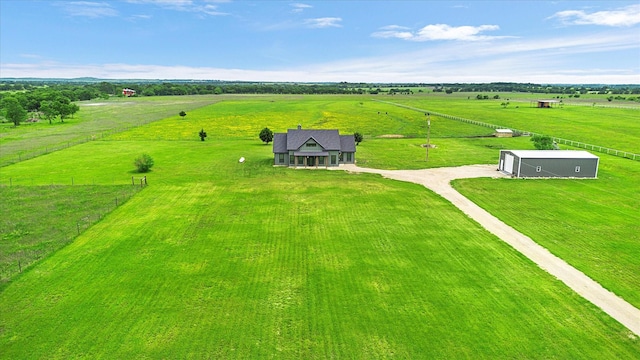 birds eye view of property featuring a rural view
