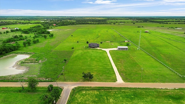 aerial view featuring a water view and a rural view