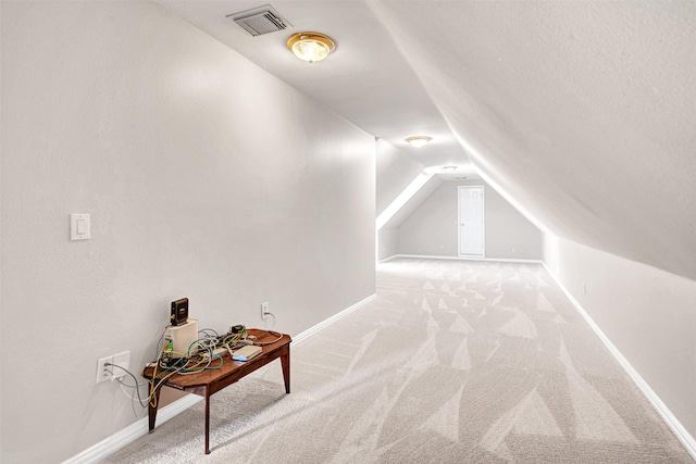 3906 Sharp Ln, Richardson, TX 75082 - bonus room with carpet flooring, baseboards, visible vents, and vaulted ceiling