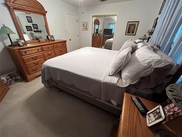 222 County Road 3331, Paradise, TX 76073 - bedroom featuring light colored carpet, visible vents, and a closet