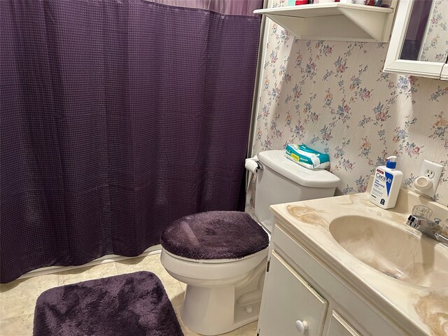 222 County Road 3331, Paradise, TX 76073 - full bathroom with tile patterned flooring, vanity, toilet, a shower with shower curtain, and wallpapered walls