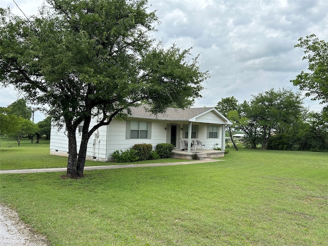 222 County Road 3331, Paradise, TX 76073 - view of front of home with a porch, a front lawn, and crawl space