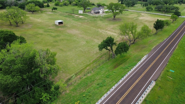 birds eye view of property featuring a rural view