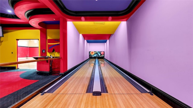 rec room featuring baseboards and bowling