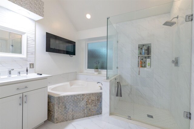 bathroom with a garden tub, vanity, lofted ceiling, recessed lighting, and a stall shower