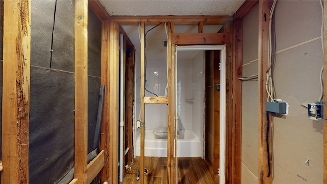 miscellaneous room with wood finished floors