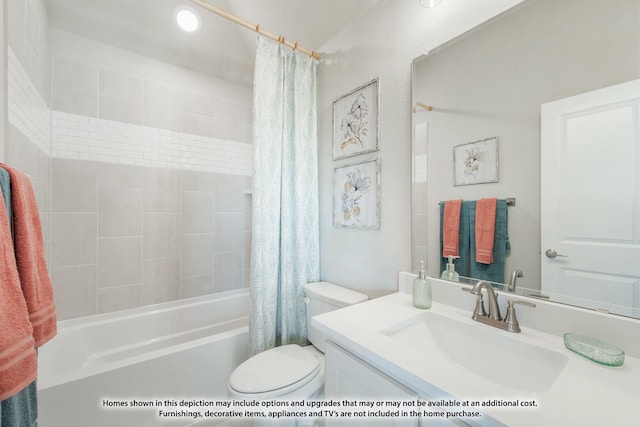 bathroom featuring vanity, shower / bath combo, and toilet