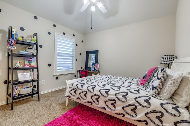 bedroom with baseboards, carpet flooring, and a ceiling fan