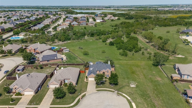 birds eye view of property featuring a residential view and a water view