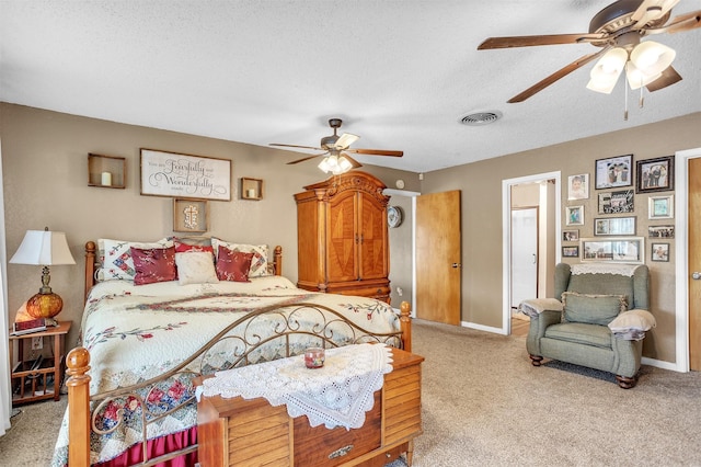 bedroom with ceiling fan, light colored carpet, baseboards, and visible vents