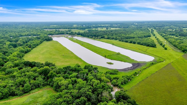 birds eye view of property with a water view and a rural view