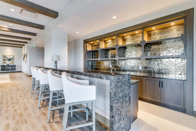 2800 Lakeside Pkwy Unit 1003, Flower Mound, TX 75022 - bar featuring recessed lighting, light wood-style flooring, wet bar, and beamed ceiling