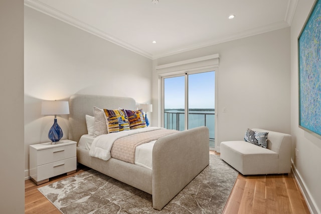 2800 Lakeside Pkwy Unit 1003, Flower Mound, TX 75022 - bedroom featuring crown molding, wood finished floors, baseboards, access to outside, and recessed lighting