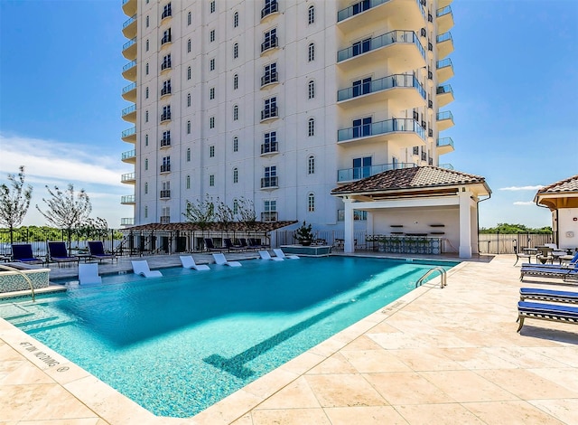 2800 Lakeside Pkwy Unit 1003, Flower Mound, TX 75022 - community pool featuring a patio and fence