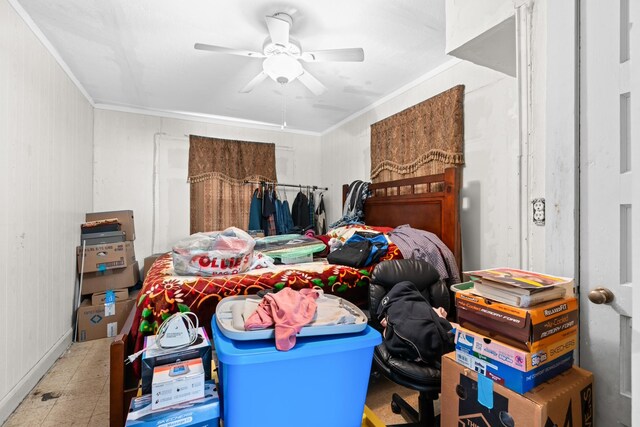 bedroom with ornamental molding and ceiling fan