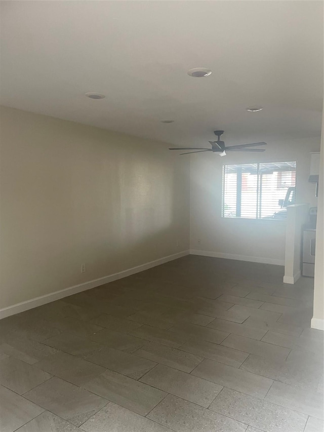 7030 Fair Oaks Ave Unit 111, Dallas, TX 75231 - unfurnished room featuring baseboards and a ceiling fan