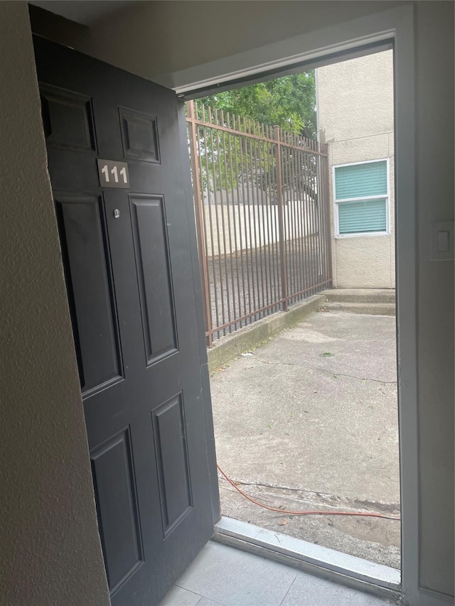 7030 Fair Oaks Ave Unit 111, Dallas, TX 75231 - view of gate featuring fence