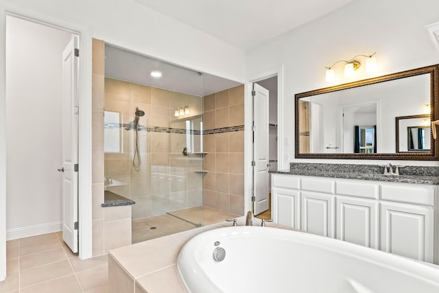 2407 Resort Dr, Heath, TX 75126 - bathroom featuring a walk in shower, tile patterned floors, a bathtub, and vanity