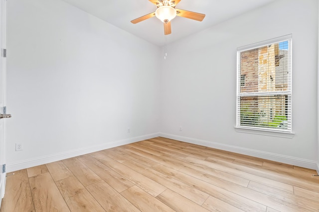 2407 Resort Dr, Heath, TX 75126 - empty room featuring baseboards, ceiling fan, light wood-style flooring, and vaulted ceiling