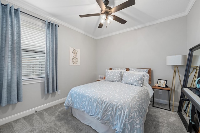 bedroom featuring crown molding, baseboards, and carpet