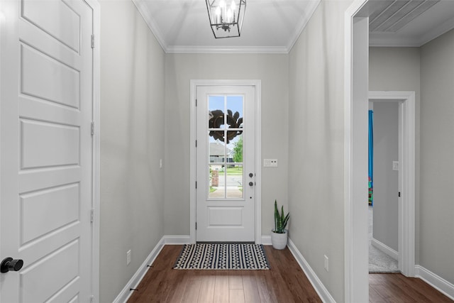 doorway featuring crown molding, baseboards, and dark wood-style floors