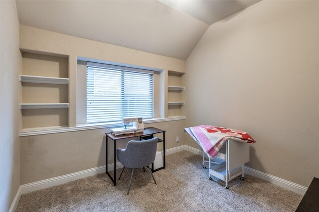 home office featuring baseboards, vaulted ceiling, and carpet flooring