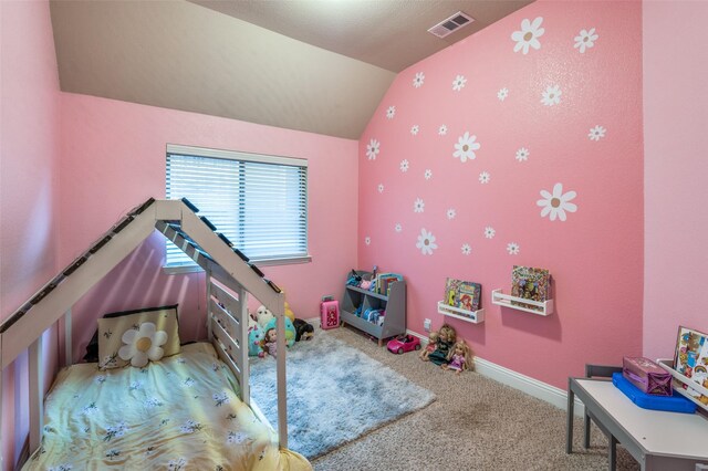 bedroom featuring visible vents, carpet flooring, baseboards, and vaulted ceiling