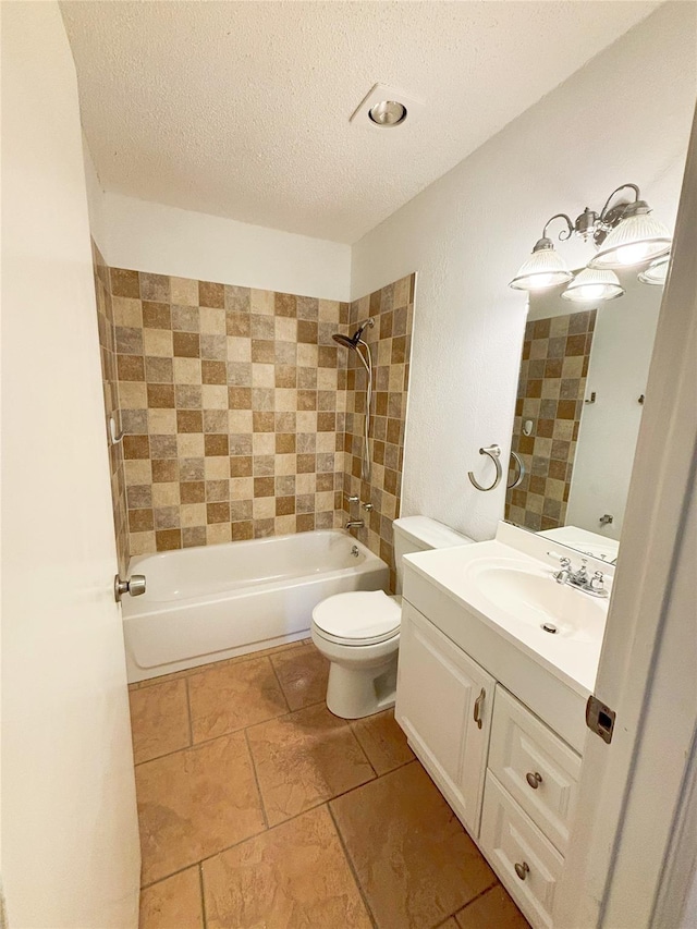 full bathroom featuring shower / bath combination, a textured ceiling, toilet, and vanity