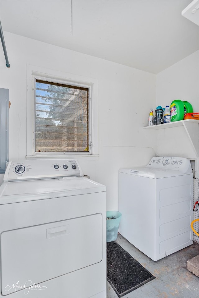 washroom featuring laundry area and washing machine and clothes dryer