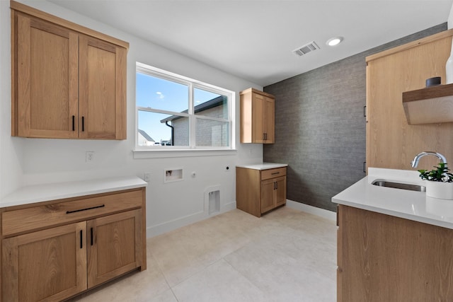 238 Glenview Cir, Belton, TX 76513 - laundry room featuring cabinet space, a sink, hookup for a washing machine, hookup for an electric dryer, and visible vents