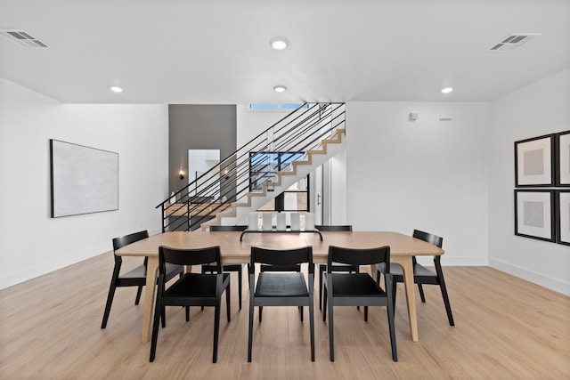 238 Glenview Cir, Belton, TX 76513 - dining room featuring stairs, baseboards, visible vents, and light wood-type flooring