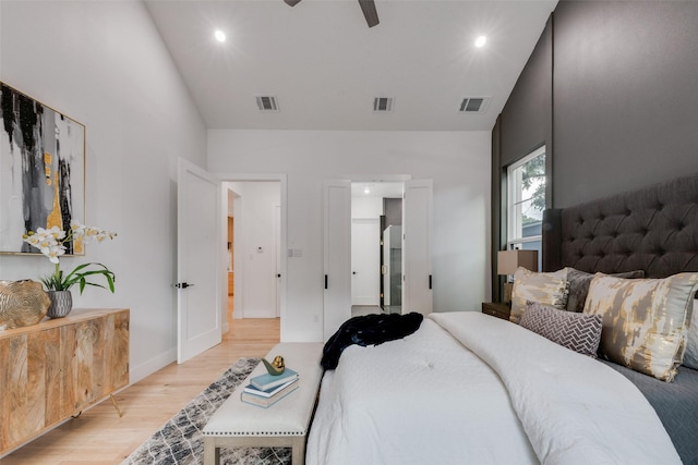 bedroom featuring recessed lighting, light wood finished floors, and visible vents