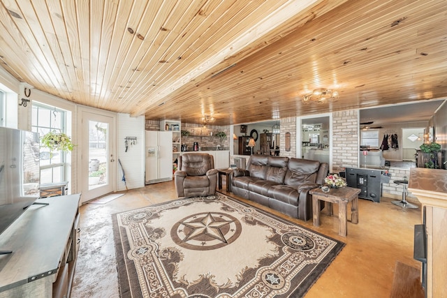 living area with wood ceiling and finished concrete floors