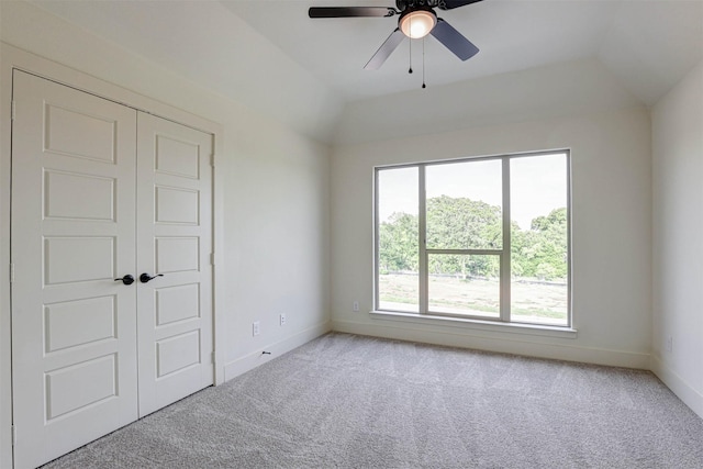 929 Ryed Ln, Fort Worth, TX 76120 - unfurnished bedroom with a ceiling fan, baseboards, a closet, lofted ceiling, and carpet flooring