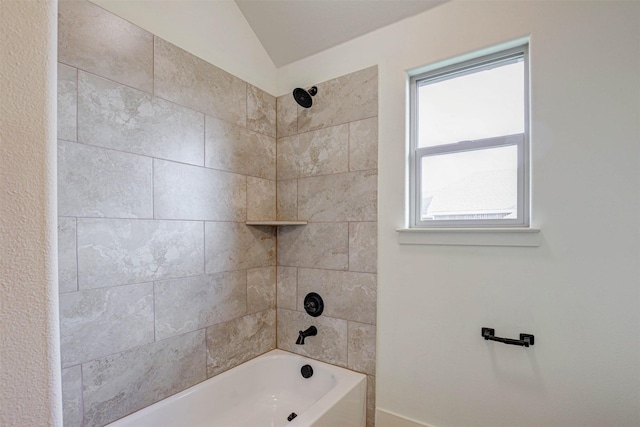 929 Ryed Ln, Fort Worth, TX 76120 - bathroom featuring lofted ceiling and shower / washtub combination