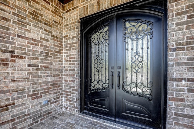 929 Ryed Ln, Fort Worth, TX 76120 - property entrance with brick siding and french doors