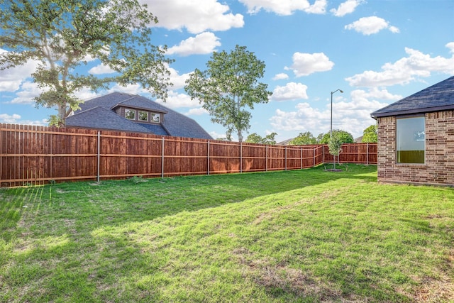 929 Ryed Ln, Fort Worth, TX 76120 - view of yard featuring a fenced backyard