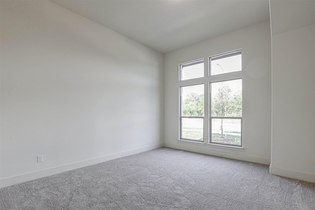 929 Ryed Ln, Fort Worth, TX 76120 - unfurnished room with baseboards and light carpet