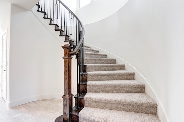 929 Ryed Ln, Fort Worth, TX 76120 - stairway featuring baseboards