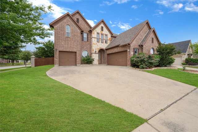 view of front of home with concrete driveway, stone siding, brick siding, and a front lawn